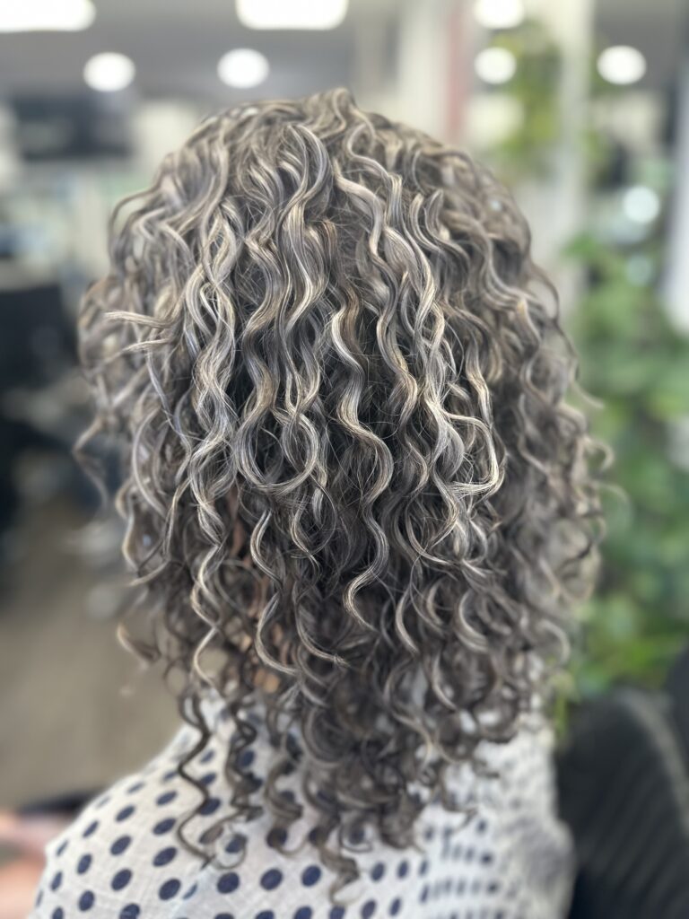 custom grey blending foils on curls